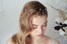 This celestial star hairvine will add a heavenly touch to your bridal look with sparkling Swarovski crystals combining to create a delicate ethereal wedding headpiece. This beautiful vine features delicate Swarovski star crystals which are set by hand into gold or silver bases and wired together with matching gold or silver plated wire alongside a dusting of the tiniest round Swarovski crystals to create a stunning stardust effect. This contemporary style will work well with bohemian or celestia Wedding Hair Vine, Sheffield Uk, Celestial Wedding, Star Headband, Ethereal Wedding, Bohemian Hairstyles, Star Hair, Crystal Stars, Wedding Headband