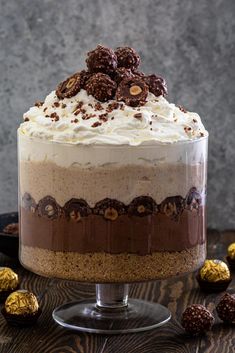 a cake with white frosting and chocolate cookies on top