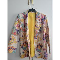 This Vintage Blazer Is A Unique Piece Of Art That Will Add A Touch Of Creativity To Your Wardrobe. The Blazer Features A Colorful Geometric Print On A Polyester Knit Fabric, With Button Closure And Padded Shoulders For A Classic Fit. The Mid-Length Blazer Has Long Sleeves And Is Perfect For Casual Or Business Occasions. The Blazer Is Brand New With Tags And Is A Size 10. It Is Lined With Polyester And Is Suitable For Summer, Fall, And Spring Seasons. The Blazer Is A Vintage Piece From The 90s, W Fitted Patterned Long Sleeve Outerwear, Multicolor Printed Blazer For Spring, Vintage Printed Outerwear For Spring, Spring Workwear Multicolor Outerwear, Spring Multicolor Outerwear For Work, Multicolor Spring Blazer For Work, Fall Printed Multicolor Blazer, Fall Multicolor Printed Blazer, Multicolor Fitted Spring Blazer