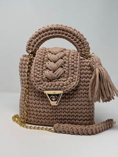 Our Crossbody Handmade Braided Purses are a unique and functional addition to any wardrobe. Made with traditional braiding techniques and high-quality materials, these purses feature a spacious interior and adjustable strap for convenient and comfortable wear. Available in various colors and styles, they are perfect for any occasion and make a great gift for fashion lovers. Upgrade your wardrobe today with this stunning accessory. Weight: 1lbs  Length: 8.5 in Width: 3in Height:10in  Whole Strap Lenght: 44in  All bags are shipped from US states. Fast shipping, good quality customer service Braiding Techniques, Knitted Bag, Luxury Bag, Bag Luxury, Handmade Bag, Bag Crochet, Bag Handmade, Designer Bag, Woven Bag