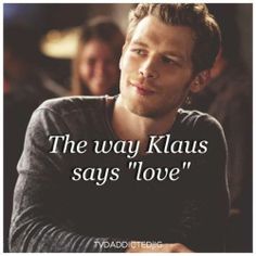 a man with his eyes closed and the words, the way klaus says love