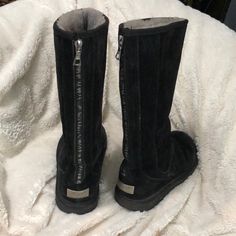 Size 9 They Have Lots Of Life Left. Tall Boot With Zipper Back And Gray Warm Lined Inside. They Are Suede On The Outside Black Boots With Zipper For Outdoor, Black Zipper Closure Boots For Outdoor, Ugg Black Boots, Black Outdoor Boots With Zipper Closure, Ugg Zipper Boots, Black Winter Boots With Zipper Closure, Tall Ugg Boots Leather, Black Ugh Boots With Bow, Fitted Black Knee-high Boots With Zipper