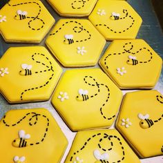 decorated cookies arranged in the shape of honeycombs