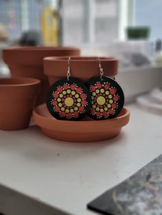 Hand painted green round wood earrings. Green Hand-painted Bohemian Earrings, Green Hand Painted Bohemian Earrings, Green Bohemian Circle Earrings, Bohemian Green Circular Earrings, Green Hand Painted Artsy Earrings, Artsy Hand Painted Green Earrings, Handmade Green Flower Earrings, Green Hand Painted Artistic Earrings, Green Mandala