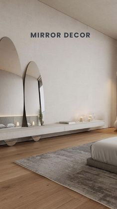 a modern bedroom with mirrors on the wall