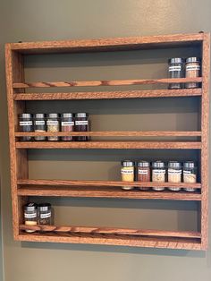 the shelves are filled with spices and seasonings