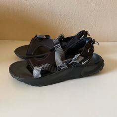 In Excellent Condition, Has Small White Stains, Not To Noticeable. Bottoms Look Brand New Black Slip-on Sport Sandals For Hiking, Black Slip-on Sport Sandals For Outdoor Activities, Black Casual Outdoor Sandals, Casual Black Sandals For Outdoor, Black Leather Sandals With Vibram Sole, Casual Black Sport Sandals For Outdoor, Non-slip Black Sandals For Outdoor, Outdoor Non-slip Black Sandals, Nike Open Toe Sandals