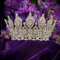 Stunning full regal bridal crown with work extended all the way around. Encrusted with Swarovski crystals and cubic zirconium for endless glitter. -Genuine Crystal -AAA Cubic Zirconia -Comb added for comfort and security -Approx. 3 in (7.6 cm) wide x 16 in. (40.6 cm) long -Rhodium Plated. Brilliant non tarnish silver finish Vintage Glam Fashion, Bridal Veils And Headpieces, Tiara Accessories, Swarovski Tiara, Crown Aesthetic, Tiara Headpieces, Bridal Tiaras, Bridal Jewelery, Crystal Bridal Tiaras