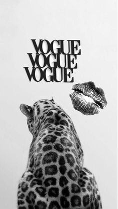 a black and white photo of a giraffe's face with the words voge voque above it