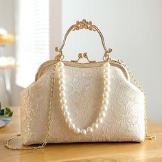 Category:Clutch; Embellishment:Pearls,Buckle,Chain; Gender:Women's; Type:Evening Bag,Wristlet; Occasion:Wedding Party,Party; Material:Polyester,Lace; Width:9; Height:19; Function:Lightweight,Multi Carry; Pattern:Solid Color; Listing Date:08/09/2024; Production mode:External procurement; Length:26; Detachable strap:Detachable; Adjustable strap:Non-Adjustable Vintage Lace Weddings, Lace Bag, Clutch Bag Wedding, Vintage Decoration, Bohemian Bags, Hippie Bags, Wedding Clutch, Beaded Wedding, Vintage Pearls