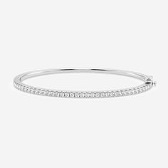 Anniversary Bangle With Brilliant Cut, Classic Round Bangle With Diamond Accents, Classic Diamond White Bangle With Diamond Accents, Classic Round Lab-grown Diamond Bracelet, Classic Wedding Bangle With Vvs Clarity, Fine Jewelry Round Brilliant Cut Bangle, White Gold Bangle With Prong Setting, Fine Jewelry Bangle With Brilliant Cut, Classic White Diamond Bangle Bracelet