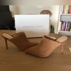 Veronica Beard Lisa Suede Heel Mules Tan, Brown Color “Latte Suede” Women’s Size 9.5 New In Box Slip On Pointed Toe Leather Lining / Leather Sole Suede Upper Heel About 3.75” The Dust Bag Included In Box Sold Out Online! Retails $395 Tags: Minimalist , Contemporary, Quiet Luxury, Elegant, Classic, Neutral, Closet Staple, Suede, Leather, Pointy Heel, Tan, Brown, Clogs, Mules, Heel Mules, Business Casual, Veronica Beard, Luxury , The Sticker Removed From Bottom Of The Heel, A Bit Sticky Due To Res Chic Suede Mules With Heel Strap, Suede High Heel Mules With Heel Strap, High Heel Suede Mules With Heel Strap, Medium Width Suede Sandals With Pointed Toe, Suede High Heel Mules Medium Width, Pointed Toe Suede Sandals With Removable Insole, Suede Sandals With Removable Insole And Pointed Toe, Elegant Suede Mules With Wrapped Heel, Elegant Brown Mules With 4-inch Heel