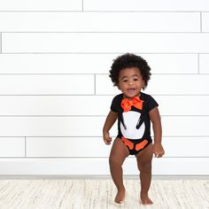 Our solid black bodysuits are classic! They’re soft, comfy, and perfect for personalization. We had our essentials independently certified with STANDARD 100 by OEKO-TEX® so that you don’t have to worry about harmful substances in your baby’s clothing. Black Cotton Onesie For First Birthday, Black Short Sleeve Onesie For Playwear, Playful Black Short Sleeve Onesie, Playful Fitted Black Onesie, Black Playful Bodysuit For Casual Wear, Black Fitted Playful Onesie, Unisex Black Short Sleeve Bodysuit, Black Cotton Bodysuit For Playtime, Playful Fitted Black Bodysuit