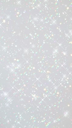 an abstract background with white stars and sparkles