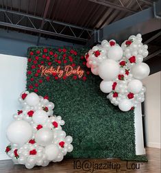 balloons and flowers decorate the backdrop for a birthday party at redbubble's