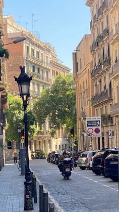 a street with cars parked on the side of it