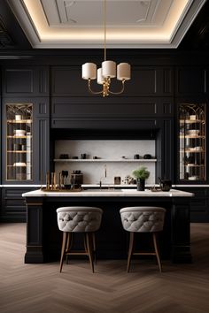 an elegant kitchen with black walls and wooden floors