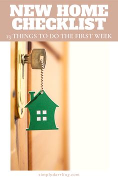 a green house key hanging from a door with the words new home checklist 13 things to do the first week