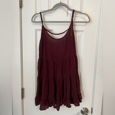 Is A Long Shirt But Could Be A Dress For Small Child! Never Worn Because I Thought It Was A Dress. Brandy Melville Is One Size Fits All. Burgundy V-neck Top For Summer, Summer Burgundy V-neck Top, Burgundy V-neck Summer Top, Summer Burgundy Sleeveless Top, Burgundy Sleeveless Summer Top, Casual Burgundy Tops For Day Out, Casual Burgundy Mini Dress For Spring, Brandy Melville Shirts, Long Shirt