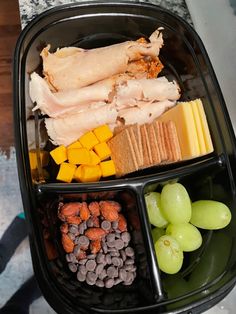 a plastic container filled with different types of food