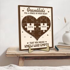 a wooden puzzle with the words grandkids fill a space in your heart that you never knew