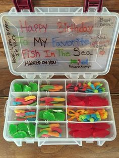 a plastic container filled with lots of different types of fish in the sea and happy birthday to my favorite fish in the sea