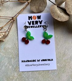 Everyone loves cherries right?! Wear these cute cherries on your ears!  Made with vegan and cruelty free pigments and glitter on stainless steel huggie hoops, these earrings sparkle as you move and attract many admiring looks! Resin is very lightweight to wear.  These measure a cute 3.5cm in total drop length. Hand made in small batches in beautiful North Norfolk, this is a slow fashion piece.  About the materials used: *All of your jewellery starts out as a blank and empty mould cavity, the mix Rockabilly Earrings, North Norfolk, Wedding Gift Baskets, Cherry Bomb, Sparkle Earrings, Handmade Charms, Huggie Earrings, Gift For Girlfriend, Jewelry Earrings Hoops