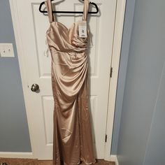 Reverly Ariel In Champagne Gold Satin. Brand New. Never Worn Or Altered. Size 6. I Was Unable To Be In The Wedding Due To A Work Conflict. Ruched Evening Dress For Bridesmaids, Champagne Sleeveless Evening Dress For Bridesmaid, Sleeveless Champagne Evening Dress For Bridesmaid, Wedding Mermaid Dress With Ruched Bodice For Prom Season, Champagne Fitted Maxi Bridesmaid Dress, Champagne Fitted Maxi Dress For Bridesmaid, Sleeveless Champagne Bridesmaid Dress, Holiday Floor-length Bridesmaid Evening Dress, Holiday Floor-length Bridesmaid Dress