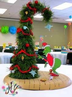 a decorated christmas tree in the middle of a room