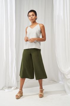 "One of the most stylish and versatile clothing pieces - wide and sweeping linen culottes. Tailored from Lithuanian softened linen fabric they make a great clothing piece for the office, effectively creates a stunning evening look as well. Design features an elastic waistband and side pockets that add a touch of elegance and comfort to even the simplest outfits. FABRIC: 100% softened Lithuanian linen COLOR: Please choose the desired color from the side menu. STYLE: Softened linen culotte pants w Versatile High-waisted Culottes With Relaxed Fit, Versatile High-waisted Relaxed Fit Culottes, Versatile Wide Leg Culottes With Relaxed Fit, Versatile Wide Leg Relaxed Fit Culottes, Versatile Relaxed Fit Culottes With Elastic Waistband, Versatile Relaxed Fit Wide-leg Culottes, Versatile Relaxed Fit Wide Leg Culottes, Versatile Wide-leg Culottes With Elastic Waistband, Versatile Ankle-length Relaxed Fit Culottes