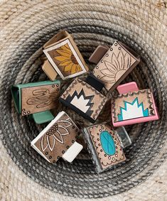 a basket filled with lots of different types of rubber stampers on top of a table