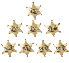 six sheriff badges with the word sheriff written on them in black and gold metal letters