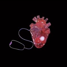 a heart shaped object with wires attached to it