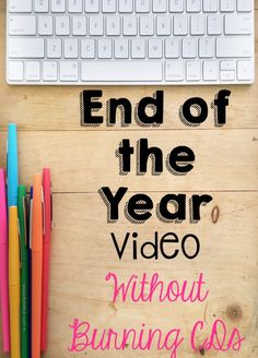 the end of the year video without running cds is shown on a desk with markers, pens and a keyboard