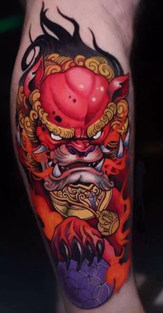 What a Foo Dog Tattoo Really Means (With Pictures) Foo Dog Tattoo Meaning, Tato Phoenix, Daruma Doll Tattoo, Japanese Tattoos For Men