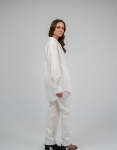 Oversize shirt made of summer natural fabric with hand embroidery. Shirt collar, button fastener. Long sleeve on the cuff.The length of the back is 76 cm / 29, 1 in. Sleeve length with cuff 63 cm / 24, 8 inCare: Machine wash 40°C. Spin: 600-800 rpm Do not tumble dry. Do not use chlorine bleaches or stain removers. Ironing: medium temperature, seamy side.Composition: 50% Tencel, 33% Cotton, 15% Linen, 2% ElastanAbout the brand:7/11 Seven Eleven has been working since July 2015. The brand creates Cotton Blouse With Embroidered Cuffs For Work, Cotton Work Shirt With Embroidered Cuffs, White Shirt With Button Cuffs For Daywear, White Cotton Shirt With Embroidered Cuffs, White Tops With Embroidered Cuffs For Workwear, White Shirt With Cuffed Sleeves And Shirttail Hem, White Shirt With Cuffed Sleeves And Spread Collar, Oversized White Shirt With Cuffed Sleeves, White Shirt With Button Cuffs And Shirttail Hem