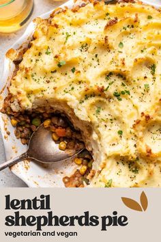 the cover of lentil shepherd's pie is shown with a spoon in it