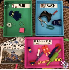 three trays filled with different items such as scissors, push and pull toys in them