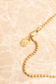 closeup of gold ball chain necklace with nametag#jannaconner #necklaces #necklacessimple #chainnecklaces #layeringnecklaces #layeringnecklacesgold #layeringnecklaceidea #layeringnecklacedainty  https://www.jannaconner.com/collections/jewelry/products/2mm-ball-chain-necklace-14k-gold-filled-janna-conner Ear Jacket Earring Gold, 3 Strand Bracelet, Vintage Statement Jewelry, Boho Statement Necklace, Marble Earrings, Tiger Eye Jewelry, Hot Jewelry, Ball Chain Necklace, Vintage Necklaces