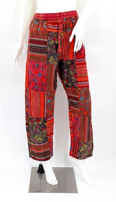 Bohemian Cotton Pants With Floral Patchwork, Bohemian Cotton Bottoms With Floral Patchwork, Hippie Floral Patchwork Bottoms For Festival, Cotton Patchwork Pants Full Length, Bohemian Patchwork Harem Pants, Bohemian Floral Patchwork Bottoms For Festival, Red Cotton Hippie Pants, Hippie Red Cotton Pants, Red Bohemian Straight Pants