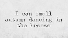 the words i can smell autumn dancing in the breeze are written on white paper with black ink