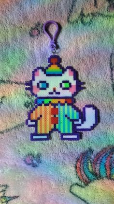 a keychain with an image of a cat on it