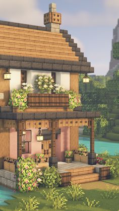 a small house with lots of plants on the roof and balconyes in front of it