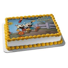 a birthday cake with cartoon characters on it