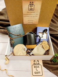 an open box containing coffee, tea and other items