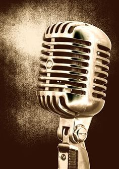 an old fashioned microphone is shown in sepia