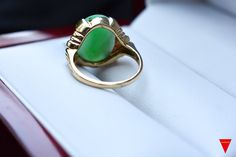 "Category Type: Rare Fine Jewelry Metal Purity:14K Yellow Gold Ring Size US: 4 3/4 Center Stone: Highest Quality Grade \"AAA\" Untreated Jadeite Jade Stone Creation: Grade \"A\" Finest Untreated Imperial Quality Jadeite Jade Additional Stones: Natural Diamond Accent Jadeite Stone Size: 6 Carat - 15mm x 12mm Ring Total Weight: 4.7 grams Condition: Preowned / Like New" Green Luxury Opal Ring For Formal Occasions, Fine Jewelry Green Opal Ring For Formal Occasions, Green Opal Ring For Formal Occasions, Classic Green Opal Ring For Formal Occasions, Formal Green Opal Ring In 14k Gold, Classic Green Opal Wedding Ring, Formal Green Hallmarked Opal Ring, Round Metal Sunglasses, Plastic Sunglasses