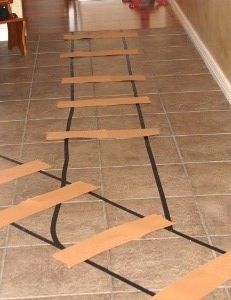 the floor is taped with tape and ready to be put in place on the wall