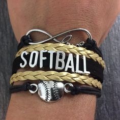 a baseball bracelet with the word softball on it