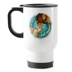 the lion king travel mug is shown with an image of two lions on it's side